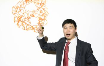 Huang with diagram of cell's genome